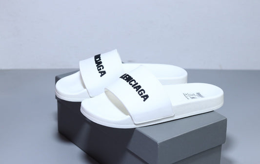 Balenciaga - SANDALI BASSI POOL SLIDE - IperShopNY