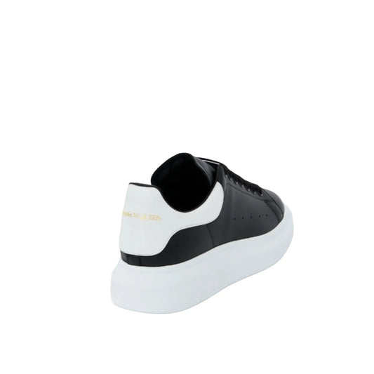 ALEXANDER McQUEEN - Sneaker Oversize Logo Gold in Nero/Bianco
