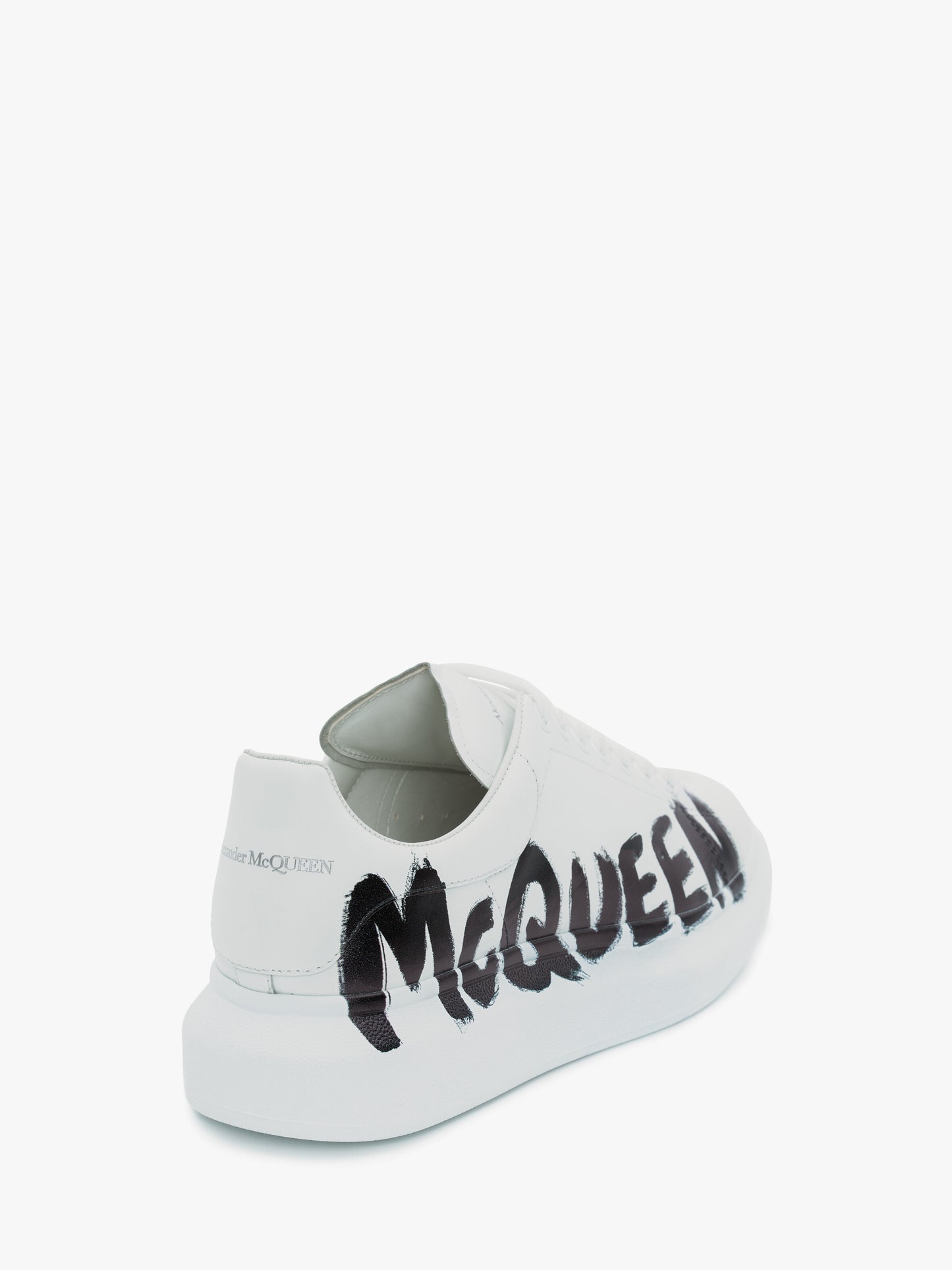 ALEXANDER McQUEEN - Sneaker Oversize McQueen Graffiti in Bianco/nero - IperShopNY