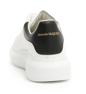 ALEXANDER McQUEEN - Sneakers Oversize in Bianco/nero - IperShopNY