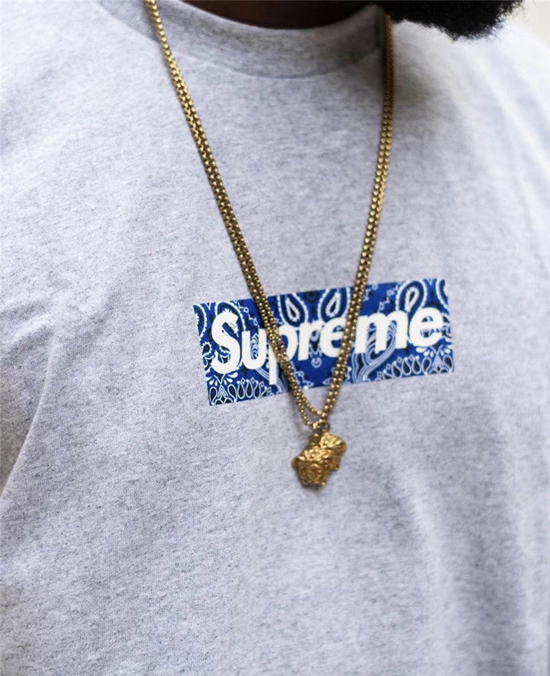 Supreme t shirt on sale logo